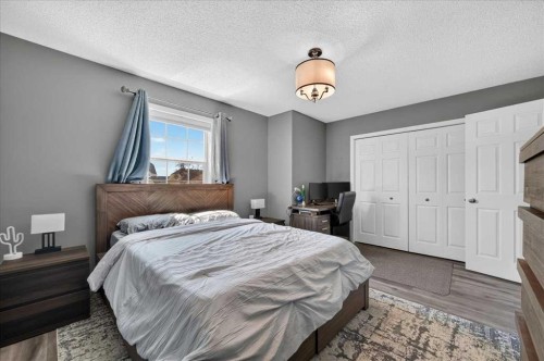 113 Tuscany Springs Gardens Nw, Calgary, AB - Indoor Photo Showing Bedroom