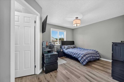 113 Tuscany Springs Gardens Nw, Calgary, AB - Indoor Photo Showing Bedroom