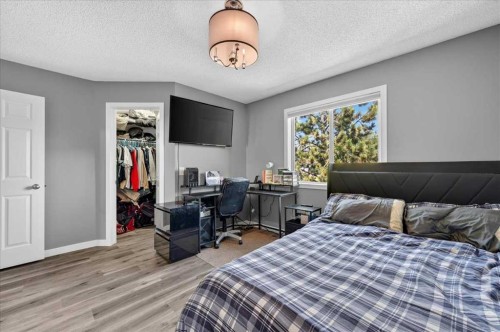113 Tuscany Springs Gardens Nw, Calgary, AB - Indoor Photo Showing Bedroom
