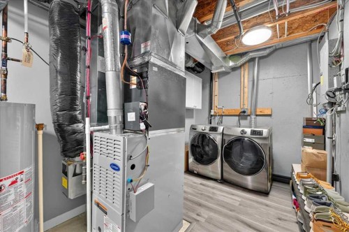 113 Tuscany Springs Gardens Nw, Calgary, AB - Indoor Photo Showing Laundry Room