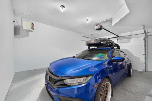 113 Tuscany Springs Gardens Nw, Calgary, AB - Indoor Photo Showing Garage