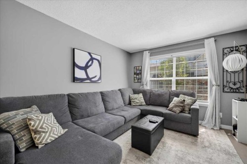 113 Tuscany Springs Gardens Nw, Calgary, AB - Indoor Photo Showing Living Room