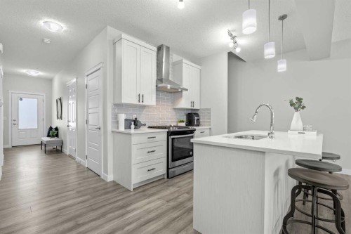 69 Carringvue Park Nw, Calgary, AB - Indoor Photo Showing Kitchen With Upgraded Kitchen