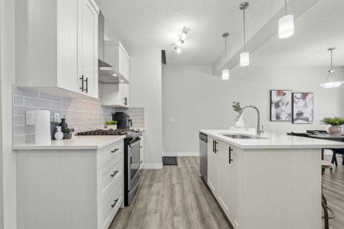 69 Carringvue Park Nw, Calgary, AB - Indoor Photo Showing Kitchen With Upgraded Kitchen