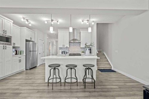 69 Carringvue Park Nw, Calgary, AB - Indoor Photo Showing Kitchen With Upgraded Kitchen