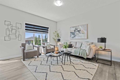 69 Carringvue Park Nw, Calgary, AB - Indoor Photo Showing Living Room
