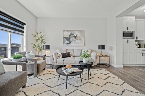 69 Carringvue Park Nw, Calgary, AB - Indoor Photo Showing Living Room