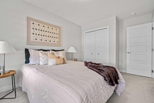 69 Carringvue Park Nw, Calgary, AB - Indoor Photo Showing Bedroom