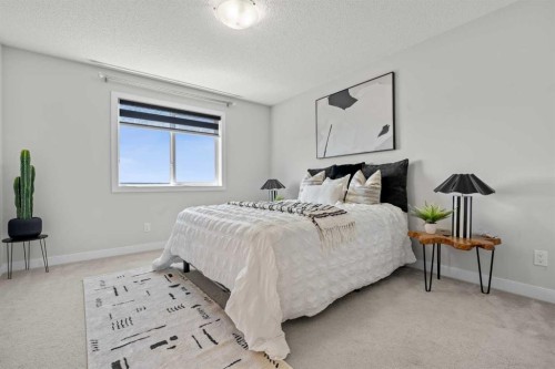 69 Carringvue Park Nw, Calgary, AB - Indoor Photo Showing Bedroom