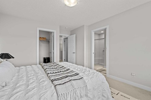69 Carringvue Park Nw, Calgary, AB - Indoor Photo Showing Bedroom