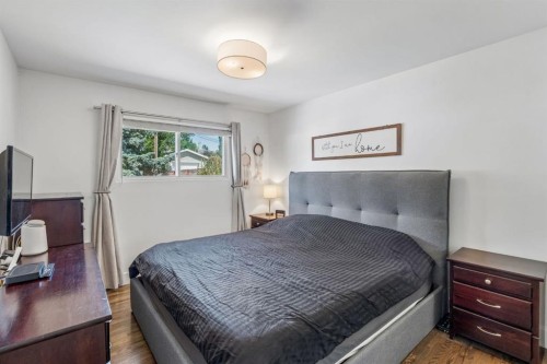 27 Heston Street Nw, Calgary, AB - Indoor Photo Showing Bedroom