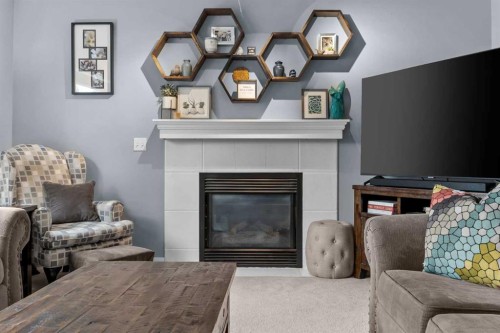 109 Hidden Valley Grove Nw, Calgary, AB - Indoor Photo Showing Living Room With Fireplace