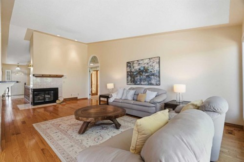 135 Shawnee Rise Sw, Calgary, AB - Indoor Photo Showing Living Room With Fireplace