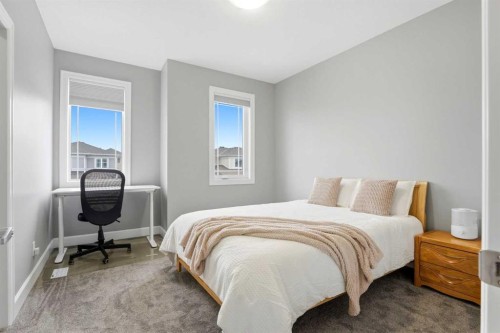 733 Windrow Manor Sw, Airdrie, AB - Indoor Photo Showing Bedroom