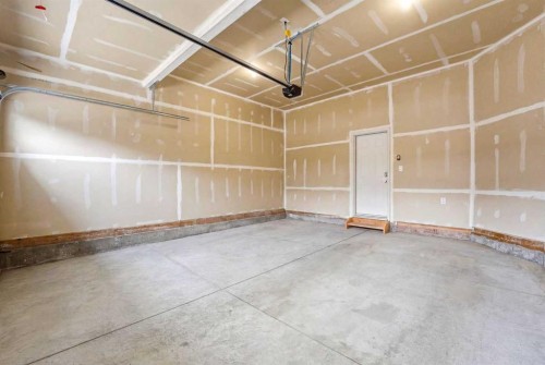 733 Windrow Manor Sw, Airdrie, AB - Indoor Photo Showing Garage