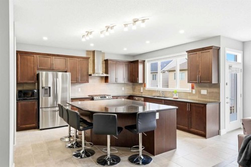 733 Windrow Manor Sw, Airdrie, AB - Indoor Photo Showing Kitchen With Stainless Steel Kitchen With Upgraded Kitchen