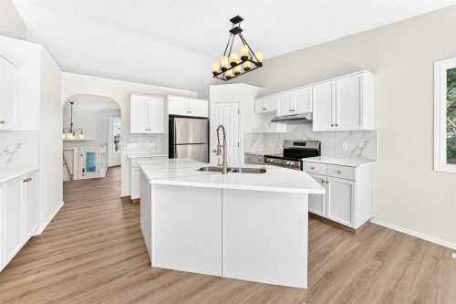 152 Harvest Park Terrace Ne, Calgary, AB - Indoor Photo Showing Kitchen With Stainless Steel Kitchen With Double Sink With Upgraded Kitchen