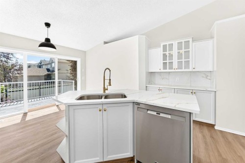 152 Harvest Park Terrace Ne, Calgary, AB - Indoor Photo Showing Kitchen With Double Sink