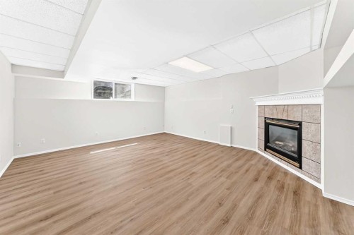 152 Harvest Park Terrace Ne, Calgary, AB - Indoor With Fireplace