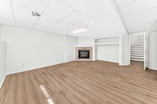 152 Harvest Park Terrace Ne, Calgary, AB - Indoor With Fireplace