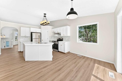 152 Harvest Park Terrace Ne, Calgary, AB - Indoor Photo Showing Kitchen With Stainless Steel Kitchen With Upgraded Kitchen
