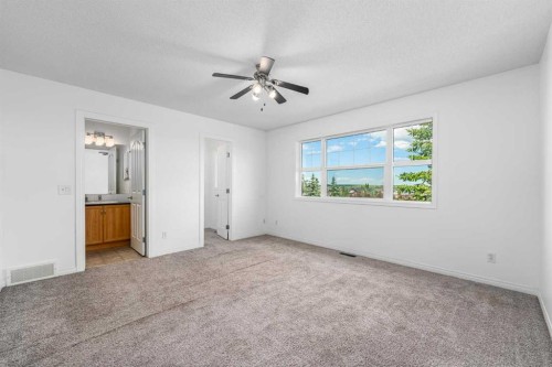 15 Panora Square Nw, Calgary, AB - Indoor Photo Showing Other Room
