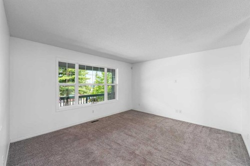 15 Panora Square Nw, Calgary, AB - Indoor Photo Showing Other Room