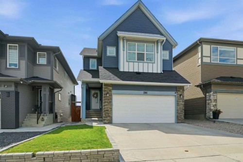 206 Lucas Crescent Nw, Calgary, AB - Outdoor With Facade
