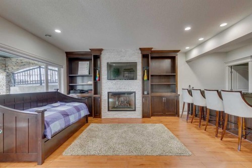 25 Aspenshire Close Sw, Calgary, AB - Indoor With Fireplace