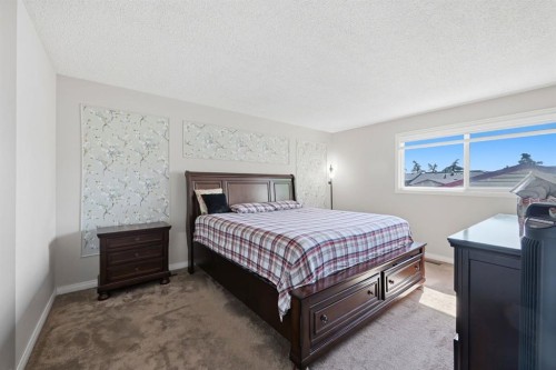 4 Fallswater Road Ne, Calgary, AB - Indoor Photo Showing Bedroom
