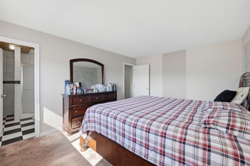 4 Fallswater Road Ne, Calgary, AB - Indoor Photo Showing Bedroom