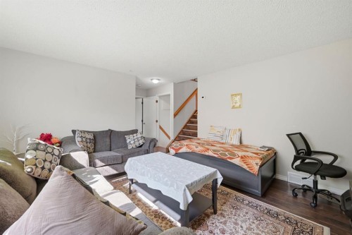 4 Fallswater Road Ne, Calgary, AB - Indoor Photo Showing Living Room