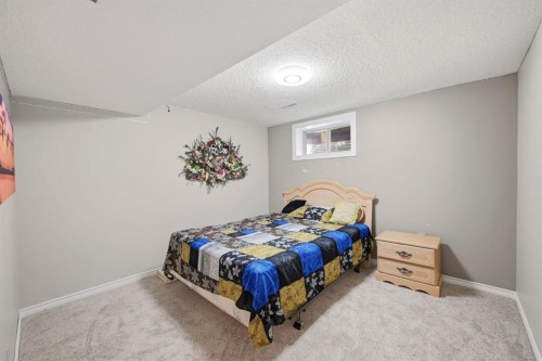 4 Fallswater Road Ne, Calgary, AB - Indoor Photo Showing Bedroom