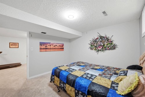 4 Fallswater Road Ne, Calgary, AB - Indoor Photo Showing Bedroom