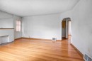 1917 Mountview Crescent Ne, Calgary, AB  - Indoor Photo Showing Other Room With Fireplace 