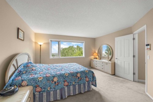 10413 Hamptons Boulevard Nw, Calgary, AB - Indoor Photo Showing Bedroom