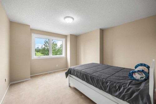 10413 Hamptons Boulevard Nw, Calgary, AB - Indoor Photo Showing Bedroom