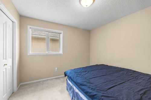 10413 Hamptons Boulevard Nw, Calgary, AB - Indoor Photo Showing Bedroom