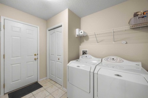 10413 Hamptons Boulevard Nw, Calgary, AB - Indoor Photo Showing Laundry Room