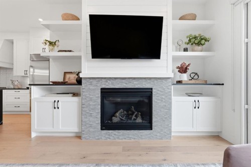 736 35 Street Nw, Calgary, AB - Indoor Photo Showing Living Room With Fireplace