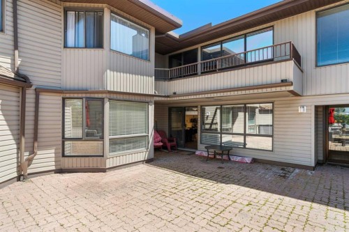 207-2425 90 Avenue Sw, Calgary, AB - Outdoor With Balcony With Exterior