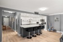 207-2425 90 Avenue Sw, Calgary, AB  - Indoor Photo Showing Kitchen With Upgraded Kitchen 