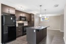 550 Mckenzie Towne Close Se, Calgary, AB  - Indoor Photo Showing Kitchen With Double Sink With Upgraded Kitchen 