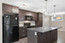 550 Mckenzie Towne Close Se, Calgary, AB  - Indoor Photo Showing Kitchen With Double Sink 