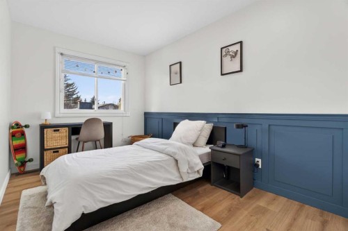 303 Woodside Place, Okotoks, AB - Indoor Photo Showing Bedroom