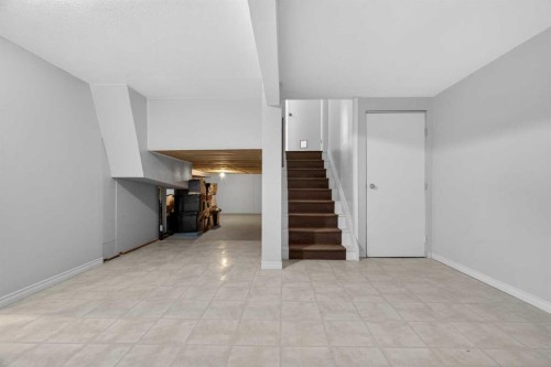 303 Woodside Place, Okotoks, AB - Indoor Photo Showing Other Room