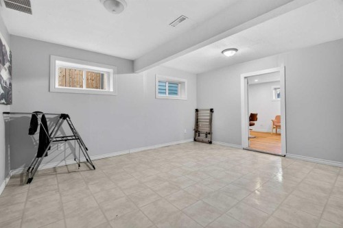 303 Woodside Place, Okotoks, AB - Indoor Photo Showing Other Room
