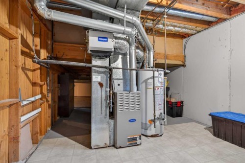 303 Woodside Place, Okotoks, AB - Indoor Photo Showing Basement