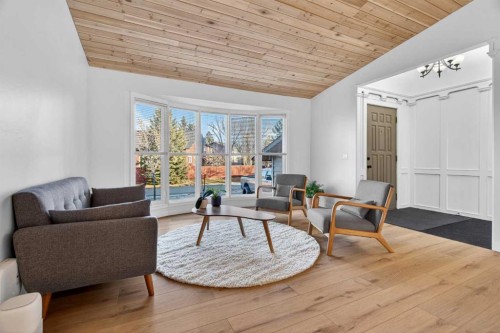 303 Woodside Place, Okotoks, AB - Indoor Photo Showing Living Room