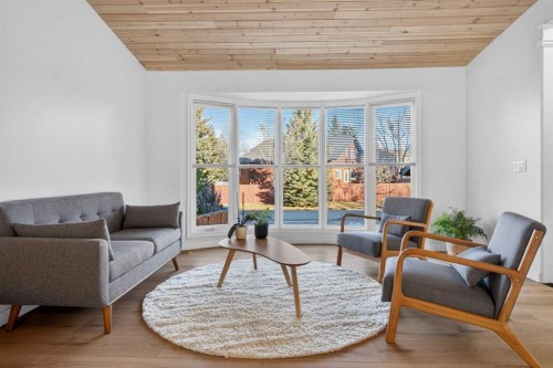 303 Woodside Place, Okotoks, AB - Indoor Photo Showing Living Room